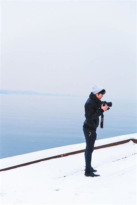 Free Stock Photo Of Man Standing On Top Of Snow Covered Slope