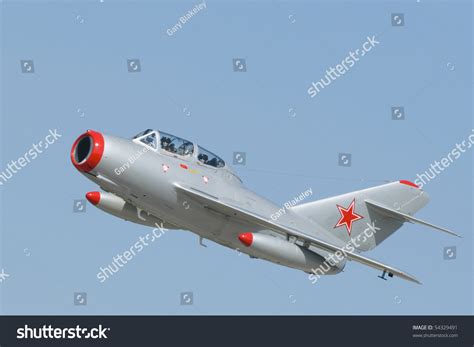 A Mikoyan-Gurevich Mig-15 Two-Seater Jet Fighter With Soviet Markings. The Mig-15 Was Developed ...