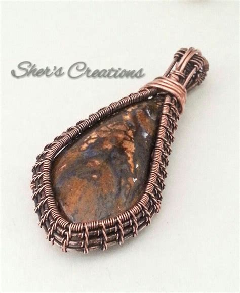 Koroit Boulder Opal Wrapped With An Oxidized Delicate Copper Woven