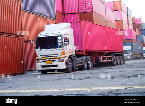 Trucks In The Container Yard Stock Photo Alamy