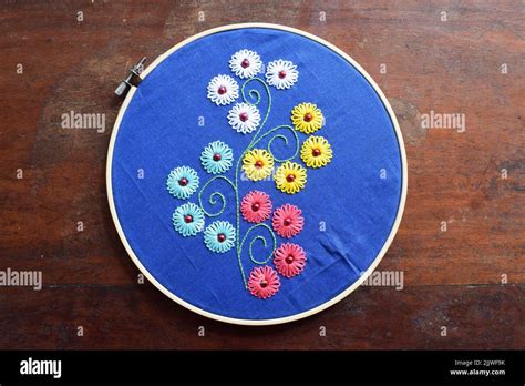 Lazy daisy flower stitches on the embroidered design Stock Photo - Alamy