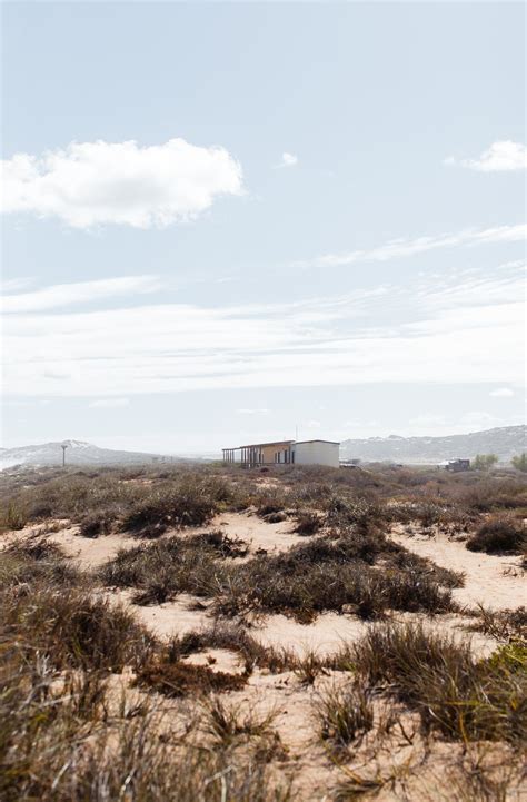 Hilly terrain covered with sandy dunes in sunlight · Free Stock Photo