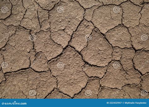 Dry Cracked Clay Soil Due To Global Warming Is Gradually Turning Into A