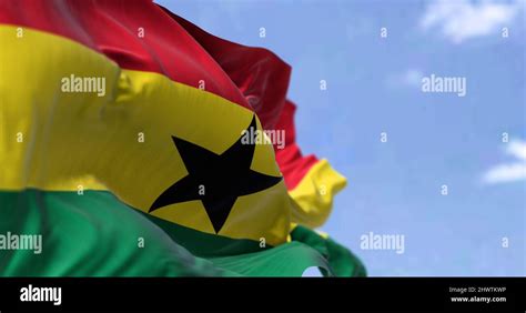 Detail of the national flag of Ghana waving in the wind on a clear day ...