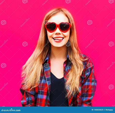 Close Up Portrait Happy Smiling Blonde Woman In Heart Shaped Red