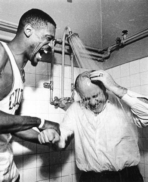 Bill Russell Laughs As Red Auerbach Takes A Shower With His Clothes On Following The Boston