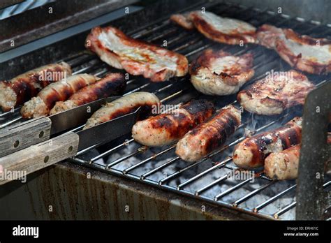 Food cooking on home barbecue over hot charcoal Stock Photo - Alamy