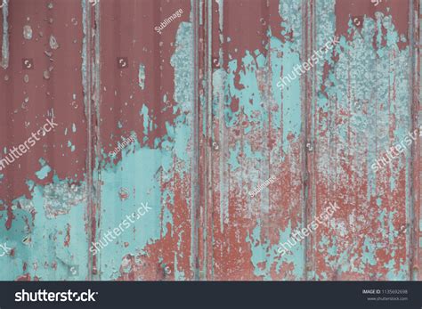 Faded Peeling Rusty Steel Sheets Oxblood Stock Photo