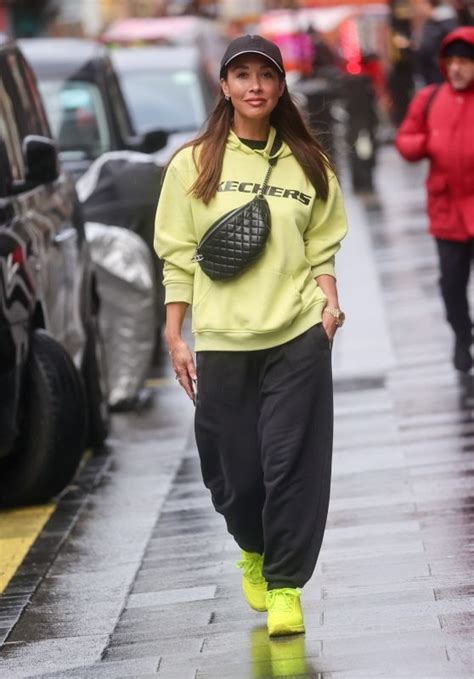 Myleene Klass In A Bright Yellow Hoodie And Neon Trainers At Smooth Fm Radio Show In London 01