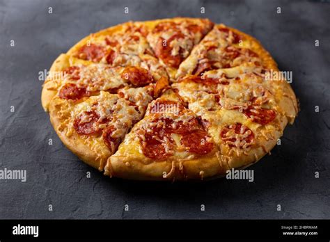 Tasty Hot Homemade Pepperoni Pizza On Dark Background Traditional