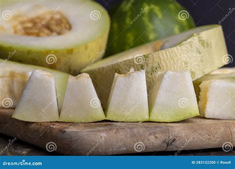 Cut Into Pieces Ripe Yellow Melon With Sweet Pulp Stock Photo Image