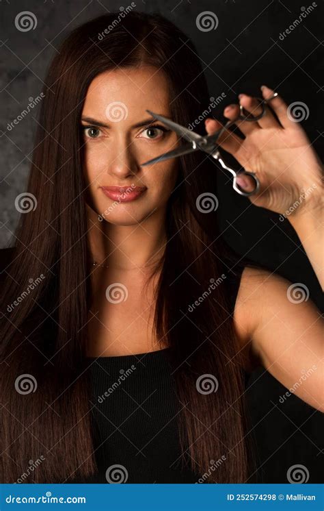 Woman Hairdresser Holds Scissors In Her Hands Stock Photo Image Of