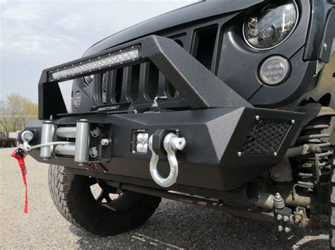 Custom bumper with winch plate allows installation of most