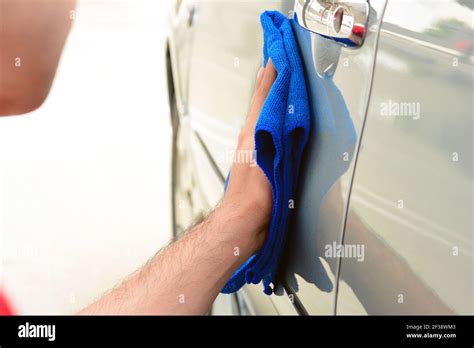 A Man Polishing Car With Microfiber Cloth Stock Photo Alamy