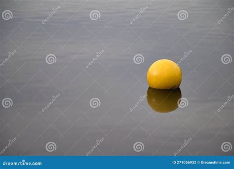 A Yellow Buoy Floating On Water Lipno Lake Stock Photo Image Of