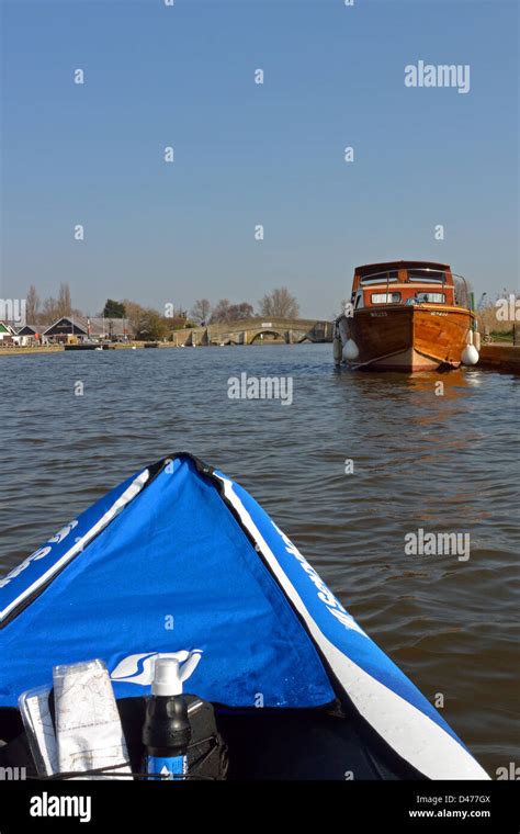 Inflatable Canoe On The River Thurne Norfolk With A Classic 1960s