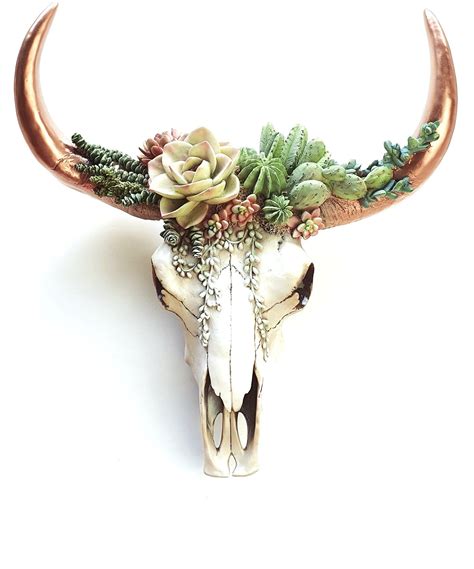 Soft Pastel Resin Succulents And Cactus Cascade Over This Faux Resin Bovine Copper Horns