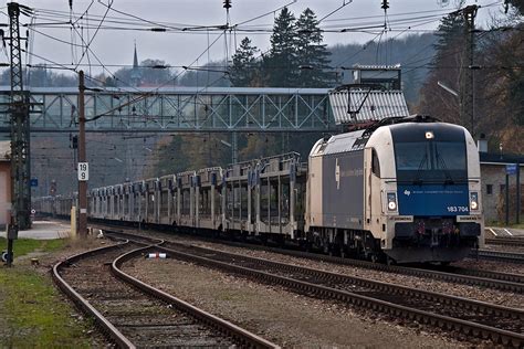 183 704 fährt mit einem leeren BLG Cargo Autozug durch Tullnerbach