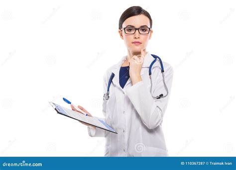 Young Woman Doctor With Stethoscope Holding Clipboard And Pen In Her