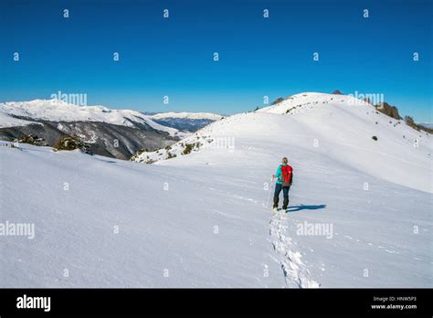 Female Figure Snowshoeing Plateau De Beille French Pyrenees Stock