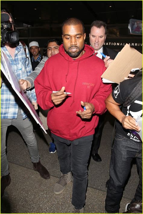 Kanye West Defends His Fashion Line On Twitter I Believe In My Ripped Homeless Sweaters