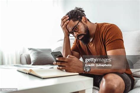 Black Man Neck Pain Photos And Premium High Res Pictures Getty Images