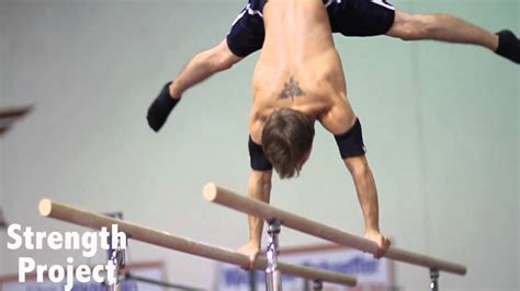 Gymnastics Skills Parallel Bars Kip To Front Straddle Cut To Handstand