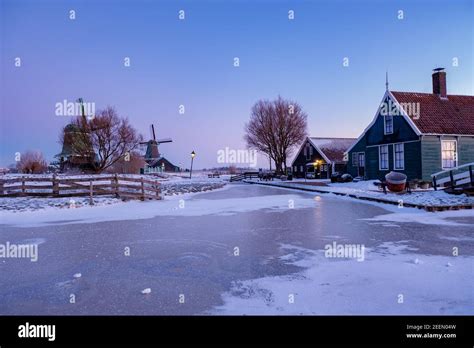 Zaanse Schans Windmill Village During Winter With Snowy Landscape Snow