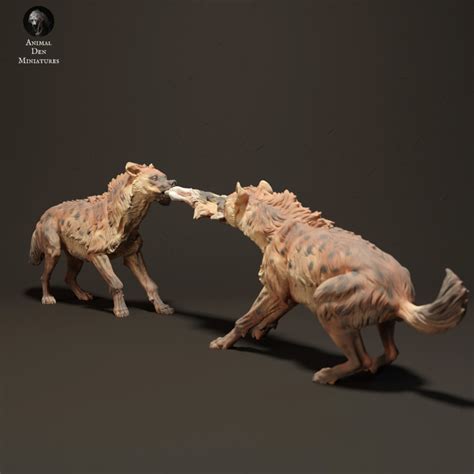 3D Printable Spotted Hyenas Fighting Over Food by Animal Den Miniatures