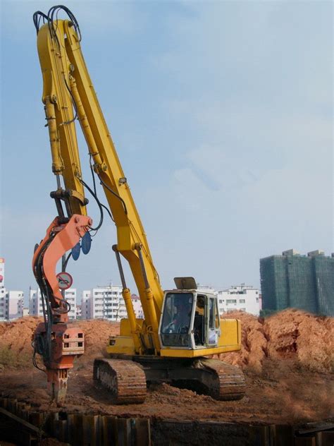 挖掘机打桩臂 破碎锤 液压剪 挖掘机安全拆楼臂 汇通重工 九正建材网