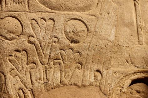 Ancient Egyptian Hieroglyphs On The Wall In Karnak Temple Complex In