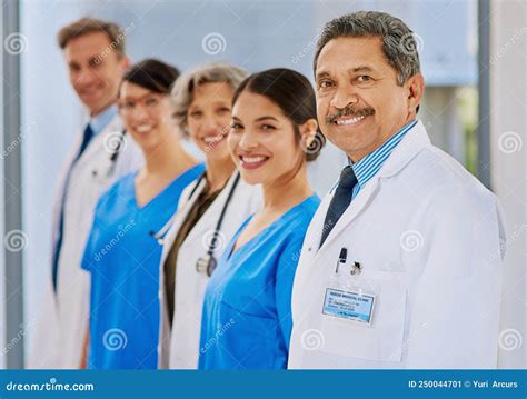 Your Team of Doctors Awaits. Portrait of a Medical Team Standing in a ...