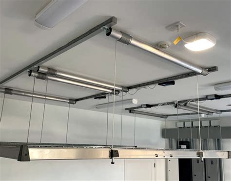 Motorized Overhead Garage Storage Lift System Installation