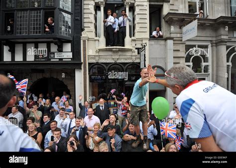 The Crowd Wave As The Parade Makes Its Way Through London Celebrating