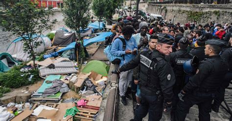 Makeshift Migrant Camp Cleared In Central Paris