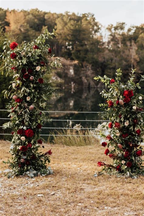 Gorgeous Ceremony Backdrop Made From Burgundy And Blush Roses And Lush