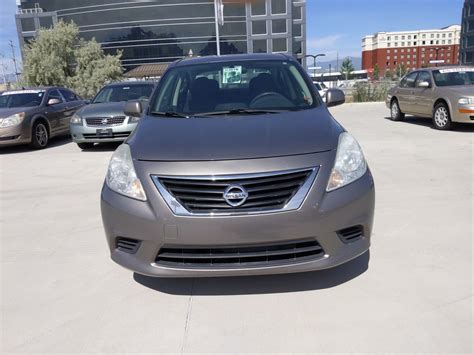 Pre Owned 2012 Nissan Versa Sv Fwd 4dr Car