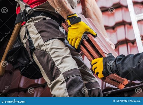 Ceramic Roof Tiles Installation Stock Photo - Image of industry ...