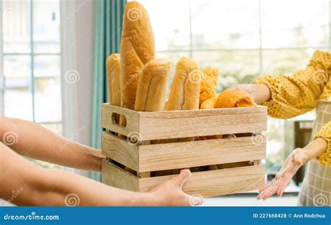 Selective Focus On Hands Giving And Deliver Wooden Basket Or Container