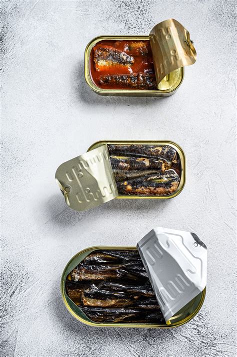 Premium Photo Assorted Canned Fish In A Tin Sardine Smoked Sardine