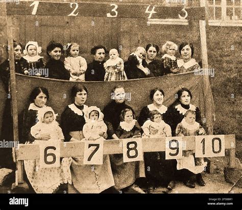 WWI - Mothers and children of an occupied French village being ...