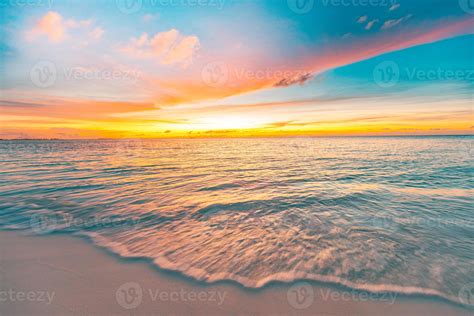 Majestic Closeup View Of Calm Sea Water Waves With Orange Sunrise