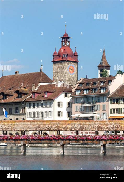 Town Hall Clock Tower And The Kapellbr Cke Chapel Bridge Across River