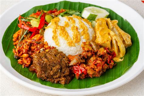 premium photo beef rendang  nasi rendang sapi   minang dish