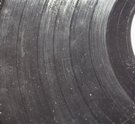 Scratched vinyl record ~ Technology Photos on Creative Market