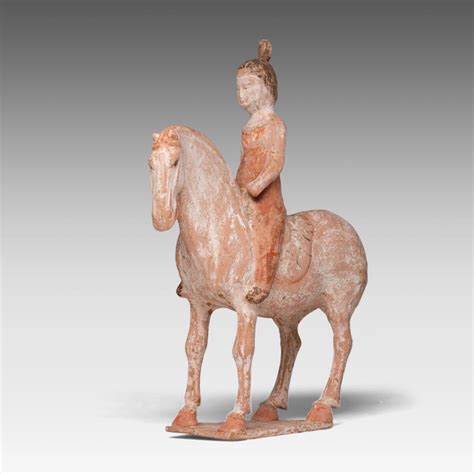 Lot A Chinese Pottery Figure Of An Equestrian Presumably Tang