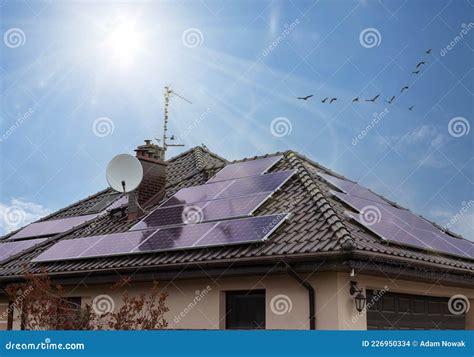 Beautiful Modern House With Solar Panels Clear Sky Sunrays Stock