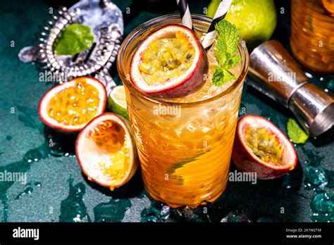 Sweet Colorful Tropical Cocktail With Passion Fruit Lime And Mint