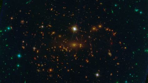 Webb Telescope Reveals An Image Of The First Galaxies Ever Npr