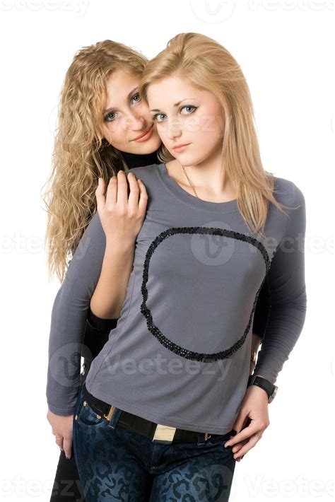 Portrait of two attractive young women. Isolated 18949607 Stock Photo ...